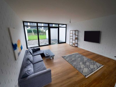 Neuwertiges Reihenmittelhaus mit PV-Anlage, Fußbodenheizung, neuem Dach, eigenem Garten & Garage