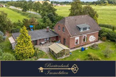 Familienfreundliches Haus mit zwei Wohnungen und weitläufigem Grundstück