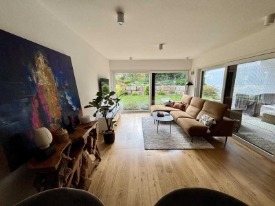 Design trifft Natur - Möblierte Neubauwohnung mit wunderschönen Garten