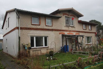 Mehrfamilienhaus mit 4 Wohneinheiten  großzügigem Grundstück in angenehmer Wohnlage
