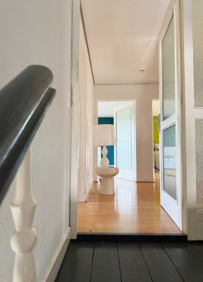 Dachgeschoss-Wohnung mit Altbau Flair
