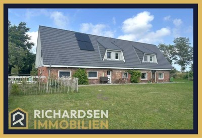 Modernisiertes Einfamilienhaus mit Einliegerwohnung in ruhiger Ortsrandlage in 25923 Uphusum