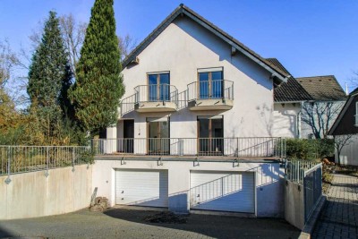 Aufgeteiltes Wohn- und Bürohaus in Sackgassenlage mit Tiefgarage und großem Naturgarten