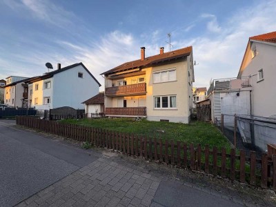Attraktives Mehrfamilienhaus mit 3 Wohneinheiten, Garten und Garage!
