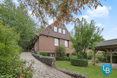 Glückwunsch, Herr Architekt! Großzügiges Einfamilienhaus mit Einliegerwohnung für Liebhaber