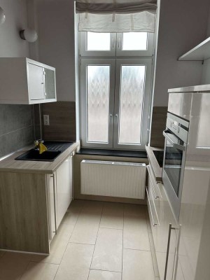Attraktive 1-Raum-EG Wohnung mit Einbauküche und Gartenmitnutzung