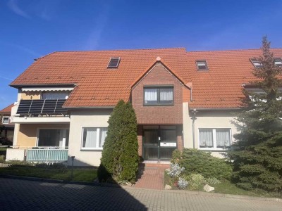 barrierefreie 3-Raumerdgeschosswohnung mit großem Balkon, Stellplatz und Garage