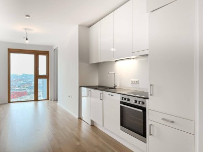 Online-Terminbuchung: Moderne 2-Zimmerwohnung mit Balkon im 15. Stockwertk inkl. Fitness, Coworking-Lounge &amp; Dachterrasse ab 01.12.2025