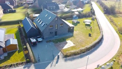 Ihr modernes Familienparadies – Stilvolles Einfamilienhaus mit großzügigem Garten in Südlage