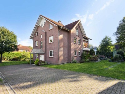 Erdgeschosswohnung mit hellem Souterrain, Terrasse und Garten in Top-Lage von Reinbek-Schönningstedt