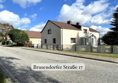 Einfamilienhaus mit Einliegerwohnung, Hof, Garage und Garten in Brusendorf