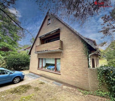 Großzügiges Zweifamilienhaus mit viel Potenzial in ruhiger Lage