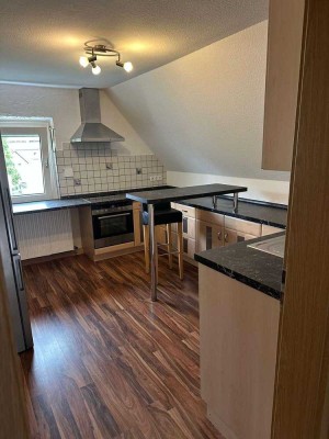 3-Zimmerwohnung mit Einbauküche, Kellerabteil und Gartenmitbenutzung
