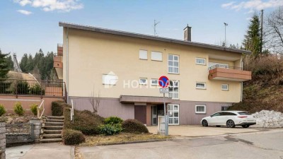 Möblierte 1,5-Zimmer-Wohnung mit Balkon und Tiefgaragenstellplatz in ruhiger Waldrandlage