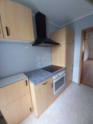 Dachgeschosswohnung mit Balkon und Einbauküche