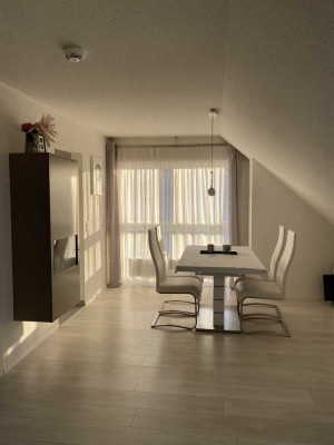 Vollständig renovierte Wohnung mit zwei Zimmern sowie Balkon und Einbauküche in Künzelsau