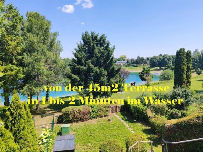 45 m2 Terrasse mit Seeblick der beeindruckt ! 117 m2 Nutzfläche = 63 m2 Wohnfläche + 54 m2 Terrassen ! + je nach Größe der Autos bis zu 3 Parkplätze inkl. + über 20 Jahre nur im Sommer von Fr -So genutzt + gepflegt + Gärtner + vor Hochwasser gesicherte In