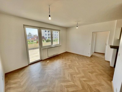 EINZIGARTIGE 2-ZIMMER TERRASSENWOHNUNG NAHE MÖDLINGER ZENTRUM