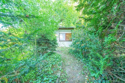 Ihr Projekt im Grünen – sanierungsbedürftiger Bungalow mit großem Grundstück