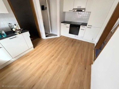 Lichtdurchflutete und modernisierte 3.5 Zimmer Wohnung mit Kamin Charme