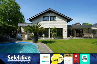 Exklusives Wohnensemble mit Südlage, Pool & Kamin – Stilvolles Einfamilienhaus in Toplage