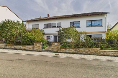 Einfamilienhaus mit Einliegerwohnung – Garten, Balkon & Kamin