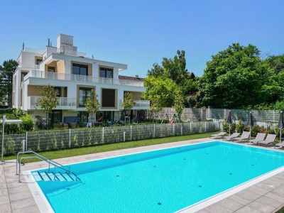 Chic City Living &amp; Pool Vibes - Exklusive Wohnung mit Flair im grünen Innenhof