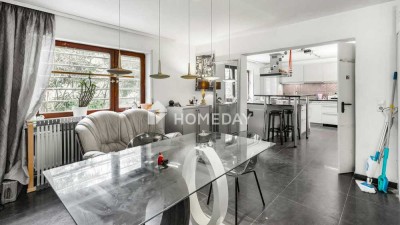 Traumhaftes Mehrfamilienhaus mit großzügigem Garten, luxuriösem Badezimmer und Wintergarten