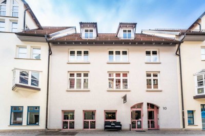 Stadtwohnung mit Balkon und Tiefgaragenstellplatz – Leben in zentraler Lage