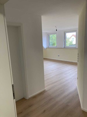 Erstbezug mit Balkon: Exklusive 1,5-Zimmer-Dachgeschosswohnung mit geh. Innenausstattung