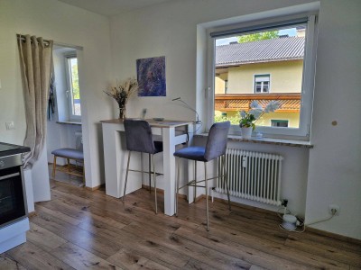 Modern eingerichtete Studiowohnung mit Gemeinschaftsgarten - zentral gelegen
