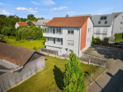 Zentral! Charmantes Zweifamilienhaus mit viel Platz und idyllischem Garten