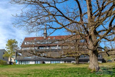 Außengewöhliche Immobilie im ehemaligen Camp King: Elegante 3 Zimmer Wohnung mit großer Terrasse