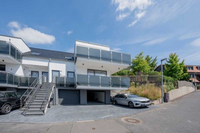 Architektur trifft Achtsamkeit: Stilvolle Etagenwohnung mit Bergblick, Terrasse & grüner Technik