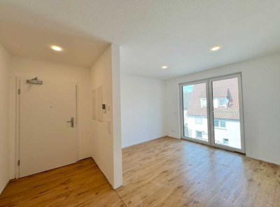 Erstbezug: 2-Zimmer-Wohnung mit Stellplatz & E-Ladeoption – nur 1 Minute zum Bahnhof Walheim