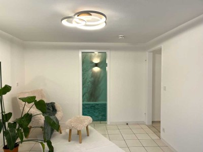 Geschmackvolle 2-Zimmer-Souterrain-Wohnung in direkter Waldlage mit EBK