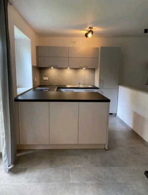 Ansprechende 3-Zimmer-Wohnung mit Garten und Einbauküche in München