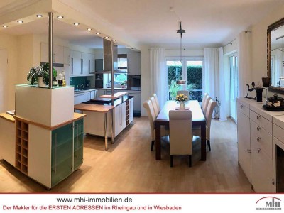 MHI - Sehr attraktive Eigentumswohnung mit Garten und zwei Tiefgaragen-Stellplätzen in Spitzenlage
