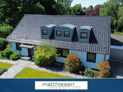 Repräsentatives Ein- bis Zweifamilienhaus mit großem Garten und Wellnessbereich