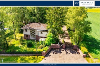 Charmantes Einfamilienhaus auf parkähnlichem Grundstück