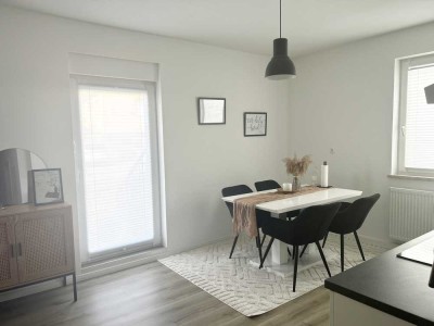 Wunderschöne 2-Zi-Terrassenwohnung mit EBK & Gemeinschaftsgarten