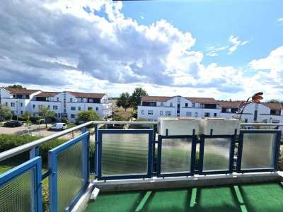 Lichtdurchflutete 2 Raumwohnung mit Südbalkon, Tiefgaragenstellplatz und Blick ins Grüne