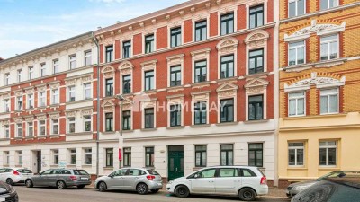 Gemütliche 2-Zimmer-Wohnung mit Balkon, EBK und Abstellkammer im sanierten Denkmalhaus