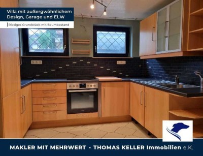 Villa mit außergewöhlichem Design. Riesiges Grundstück. Doppelgarage. Einliegerwohnung.