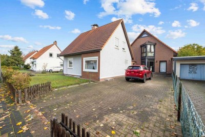 �Zwei Häuser, ein Grundstück -Doppelchance in Hambühren