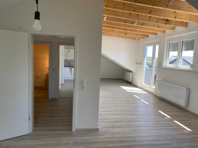 Top-moderne, Wohnung im Effizienzhaus 85 mit großer Gaube in Zentrumsnähe