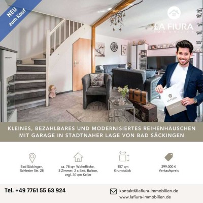 Modernisiertes Reihenhäuschen mit Einbauküche, zwei Bädern, Balkon, Keller und Garage
