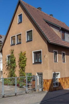 2-3 -Familienhaus mit separatem Büro
