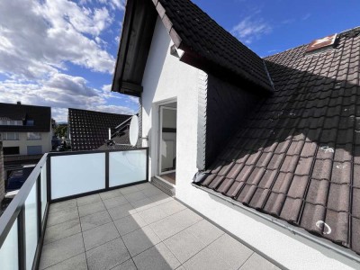 Charmante DG-Wohnung in Dreifamilienhaus – mit 9 m² Balkon