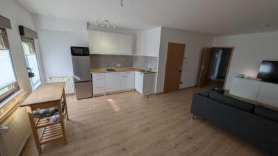 Möblierte, smarte 2-Zimmer-Dachgeschosswohnung mit französischem Balkon in Heigenbrücken